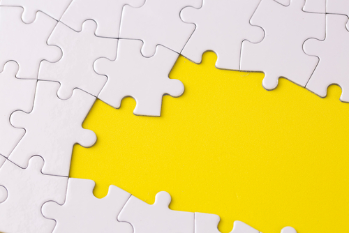 Missing,Jigsaw,Puzzle,Pieces.,Business,Concept.,Fragment,Of,A,Folded Complexité en entreprise